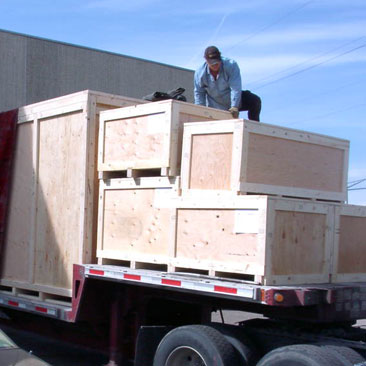 loading crates on truck